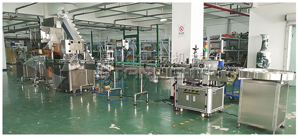 大型雞精全自動灌裝機械設(shè)備